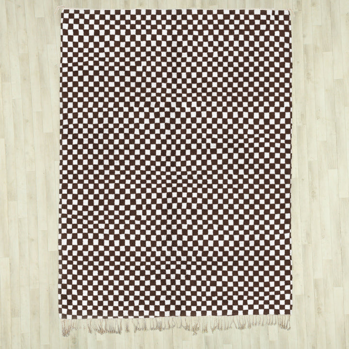 A shag Moroccan Beni Ourain Brown and White checkered rug