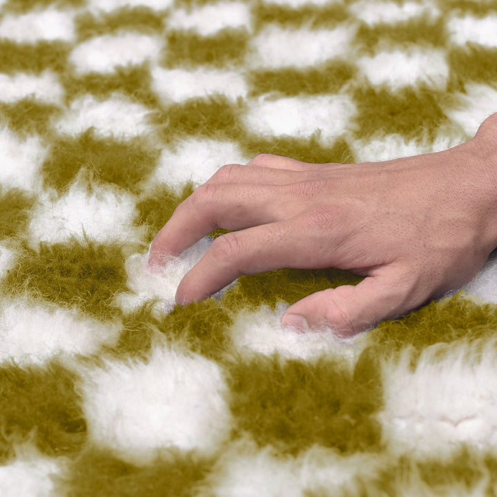 A sheepskin Beni Ourain Moroccan Yellow and White checkered rug