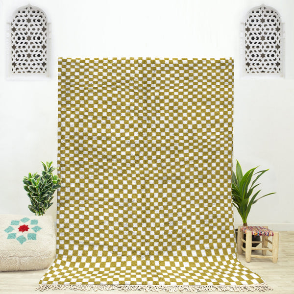 A sheepskin Beni Ourain Moroccan Yellow and White checkered rug