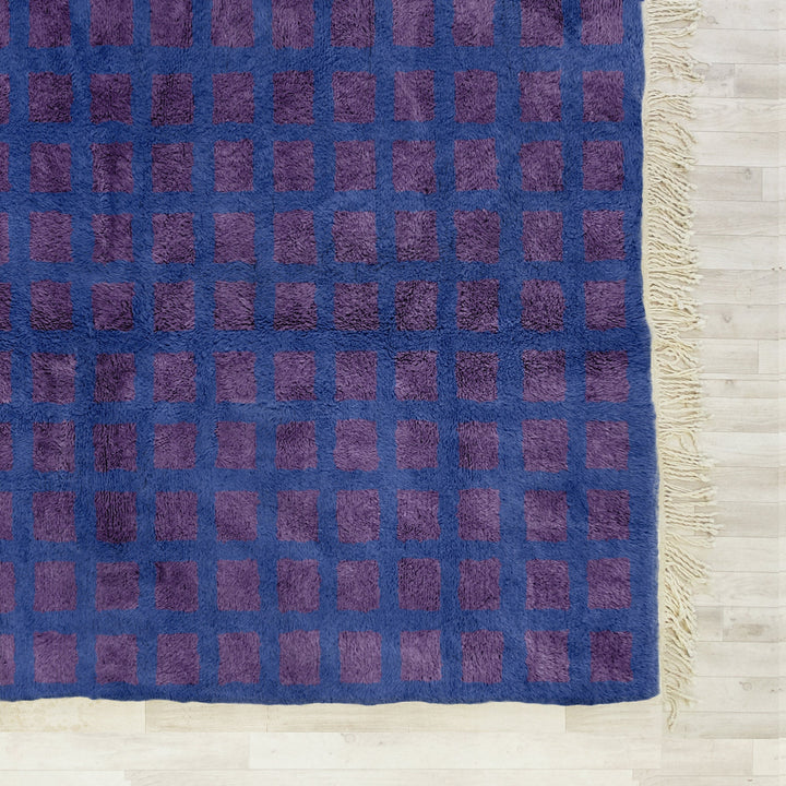 A custom Purple Bohemian Moroccan Beni Ourain checkered rug