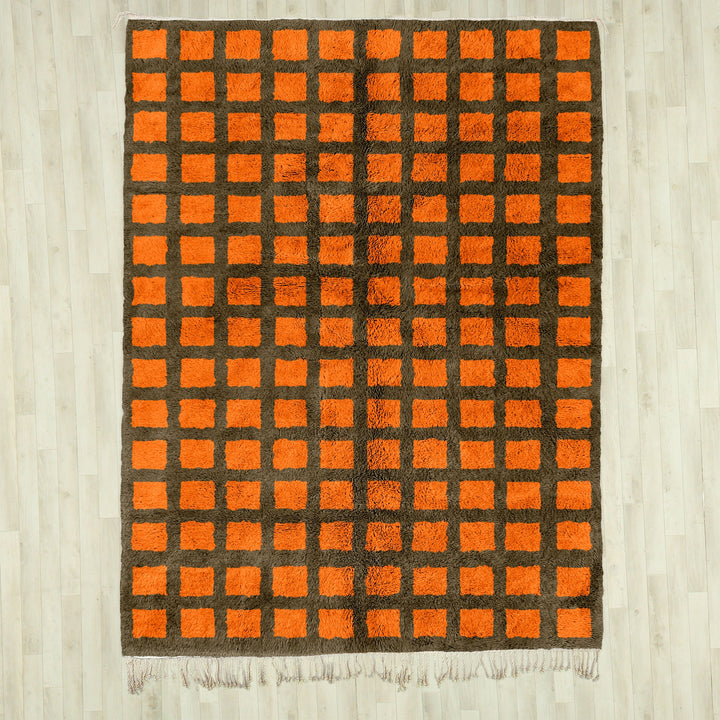 A sheepskin Moroccan Beni Ourain Orange and Grey checkered rug