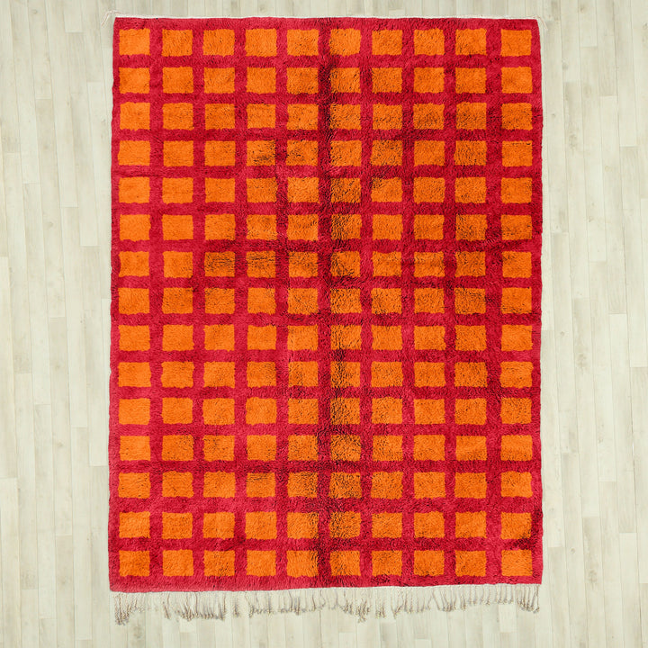 A custom handmade Orange Moroccan Berber checkerboard rug