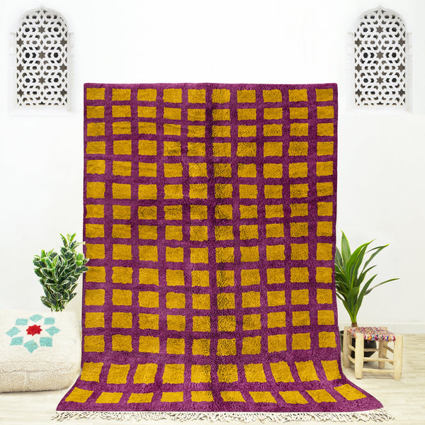 A shag Moroccan Beni Ourain Yellow and Purple checkered rug