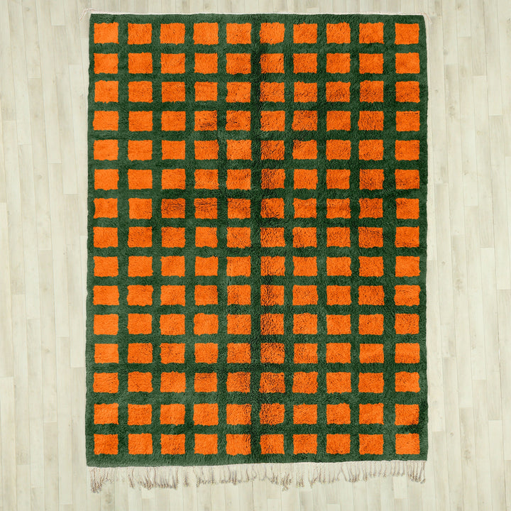 A sheepskin Moroccan Beni Ourain Orange and Green checkered rug