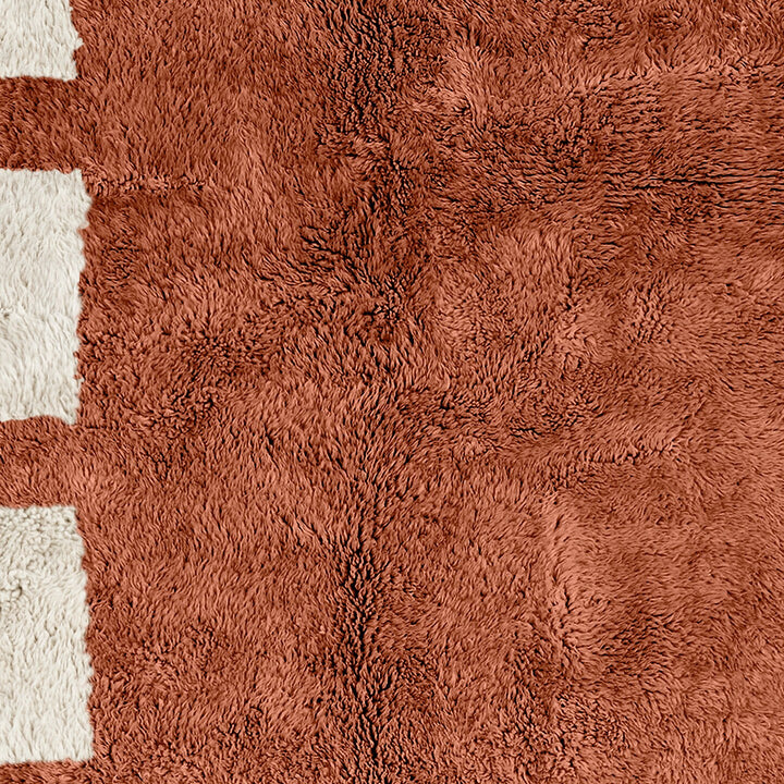 A Brown handwoven Moroccan Berber checkered rug