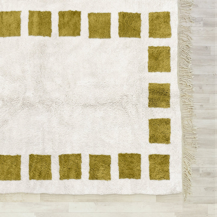 A Yellow handwoven Moroccan Berber checkered rug