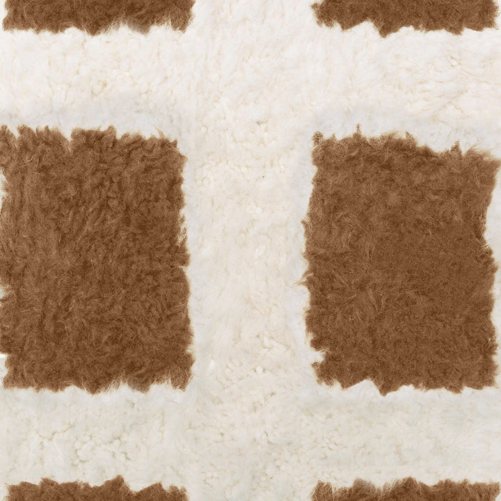 A sheepskin Beni Ourain Moroccan Brown and White checkered rug