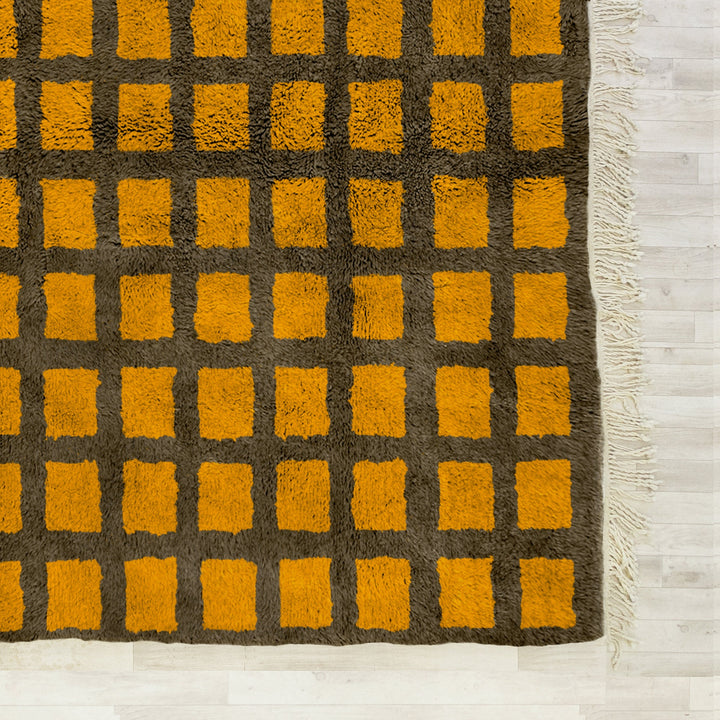 A custom Yellow sheepskin Moroccan Beni Ourain checkered rug