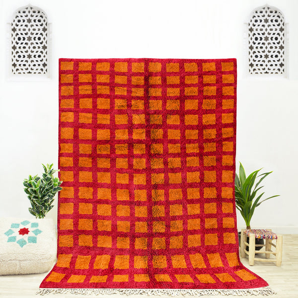 A custom handmade Orange Moroccan Berber checkerboard rug