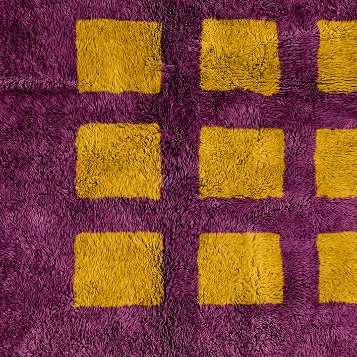 A shag Moroccan Beni Ourain Yellow and Purple checkered rug