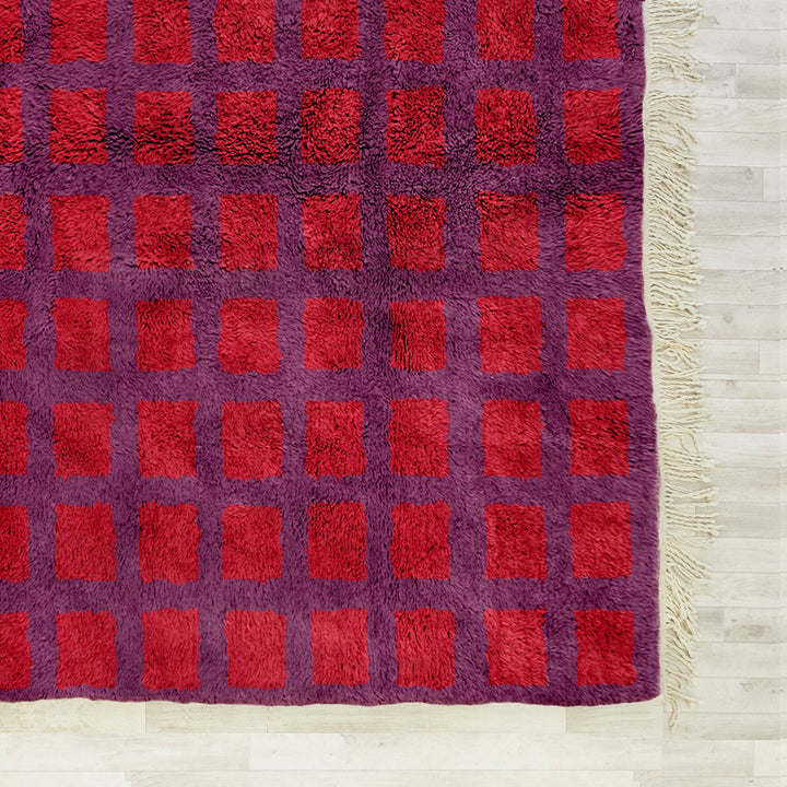 A Red boho Moroccan Beni Ourain checkered rug