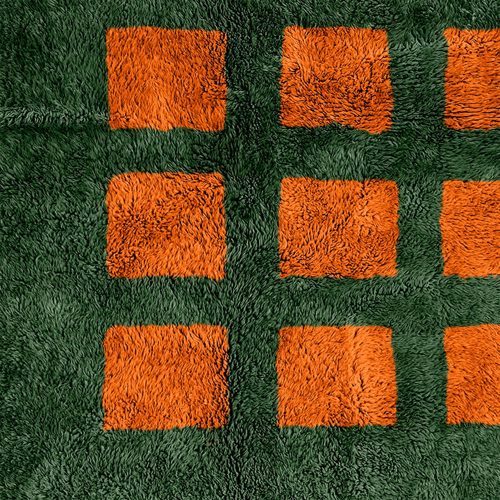 A sheepskin Moroccan Beni Ourain Orange and Green checkered rug