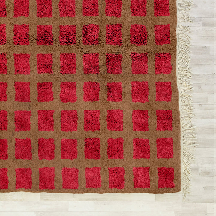 A sheepskin Moroccan Beni Ourain Red and Brown checkered rug