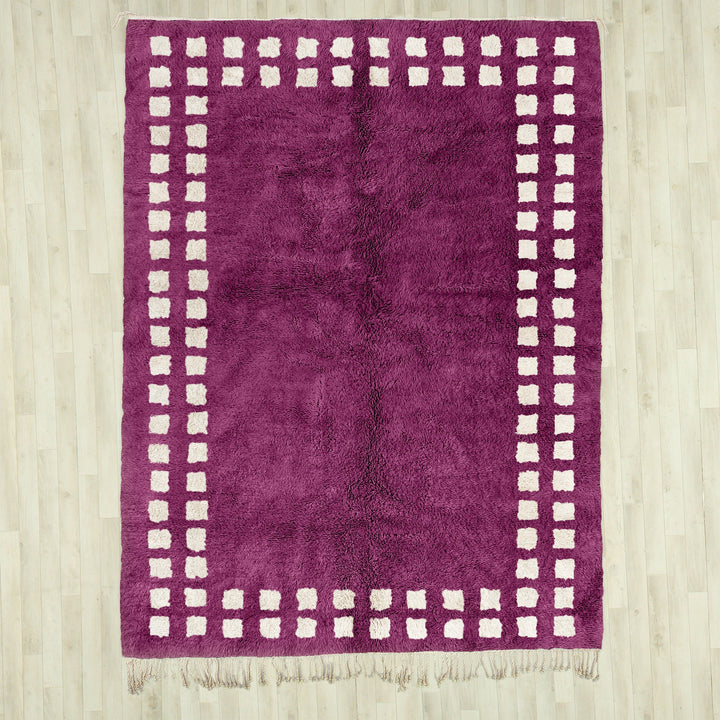 A sheepskin Moroccan Beni Ourain Purple and White checkered rug