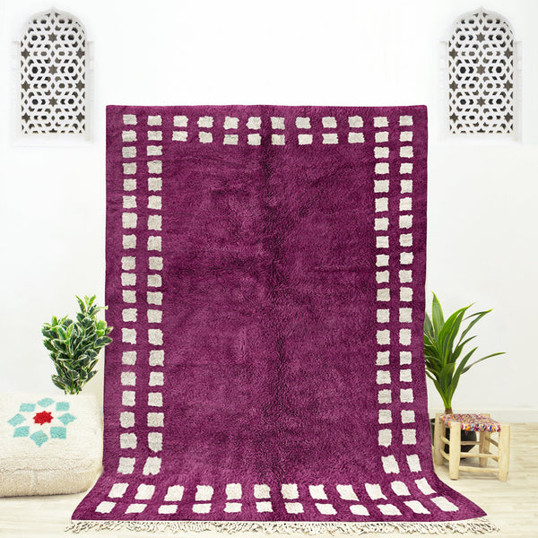 A sheepskin Moroccan Beni Ourain Purple and White checkered rug