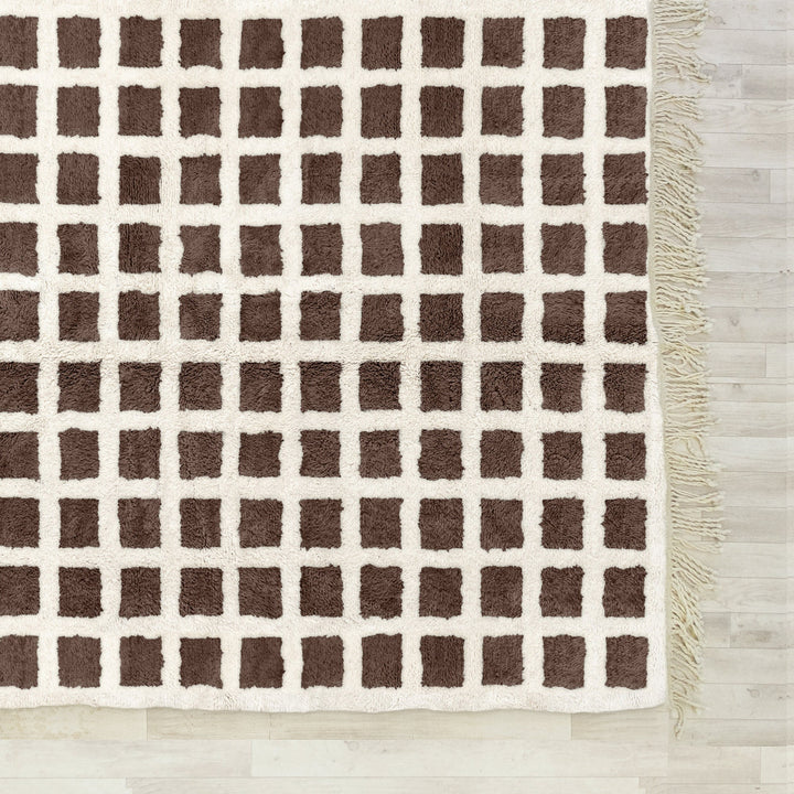 A Brown area Moroccan Beni Ourain checkerboard rug